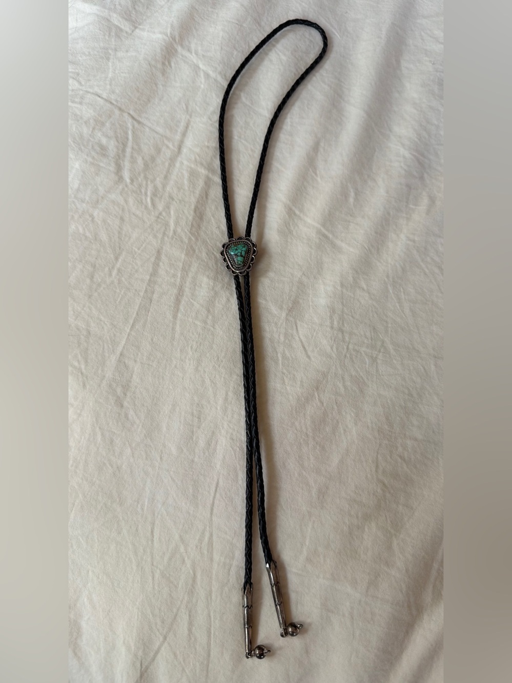 Vintage Southwest leather bolo tie, turquoise and silver-toned metal